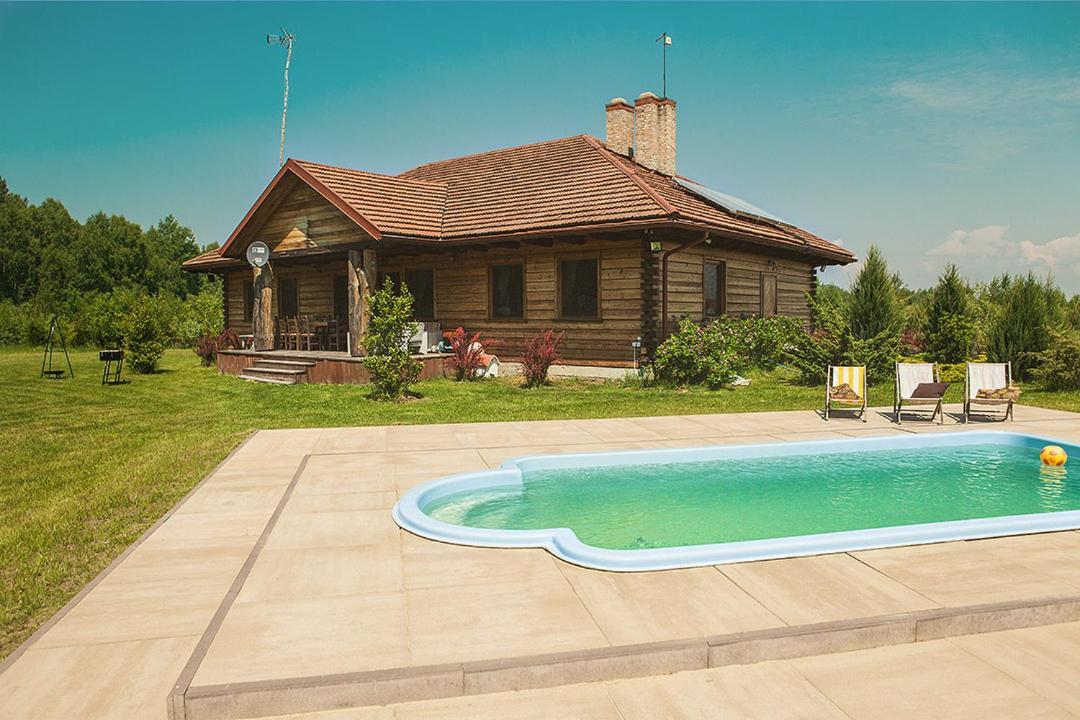 Dworek Ogrodniki: Rustic Retreat with Pool, Sauna, and Lakeside Charm Tuczna Exterior photo